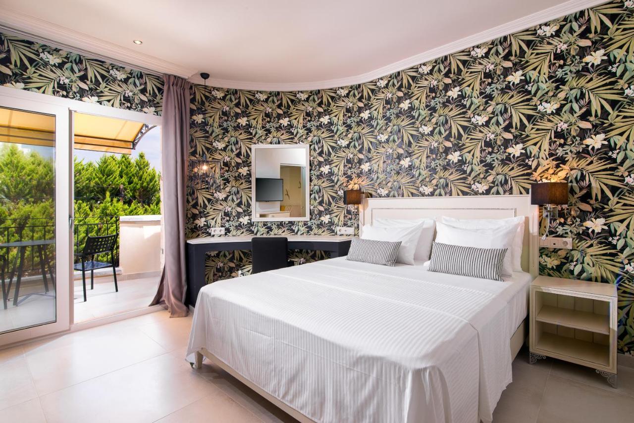 Neikos Mediterraneo Luxury Suites ฮานิโอติ ภายนอก รูปภาพ