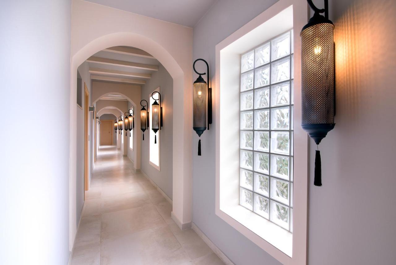 Neikos Mediterraneo Luxury Suites ฮานิโอติ ภายนอก รูปภาพ