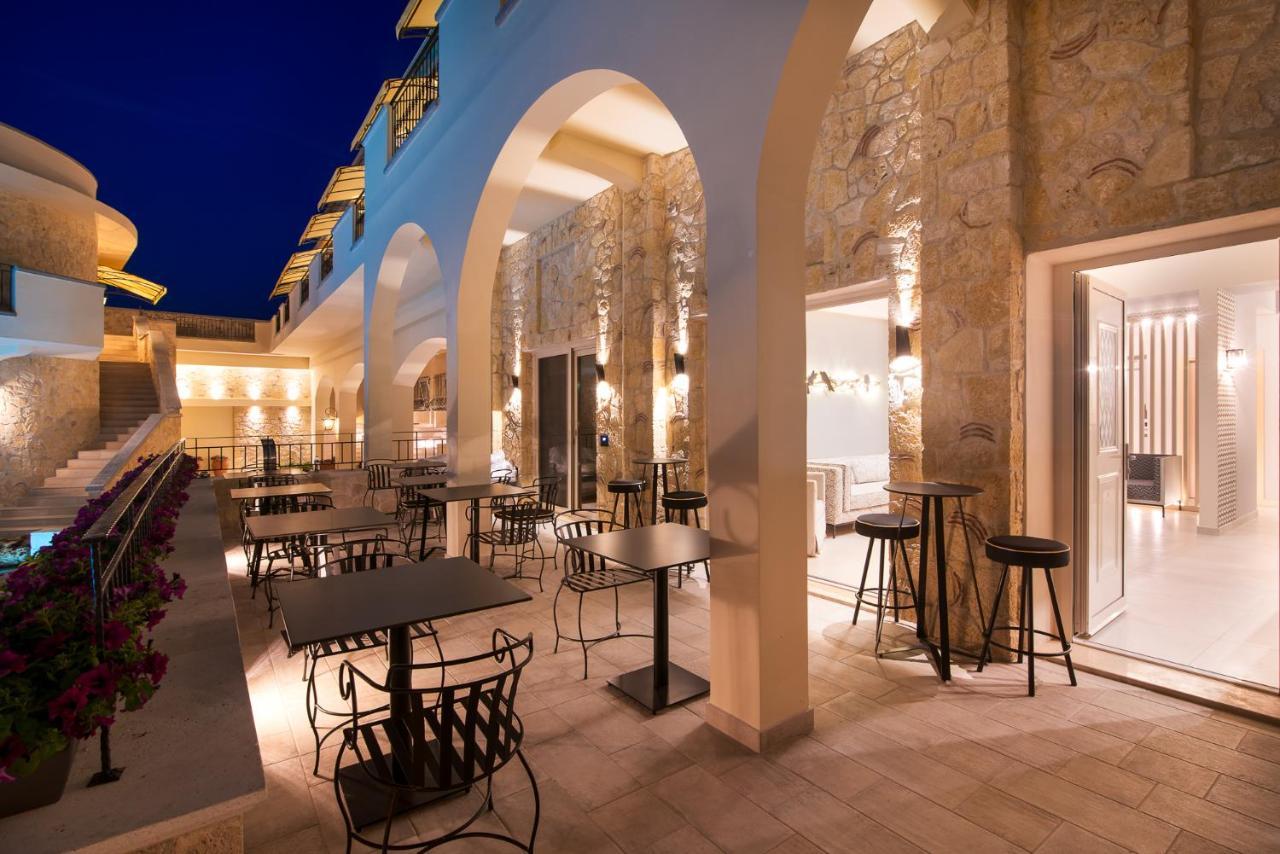 Neikos Mediterraneo Luxury Suites ฮานิโอติ ภายนอก รูปภาพ